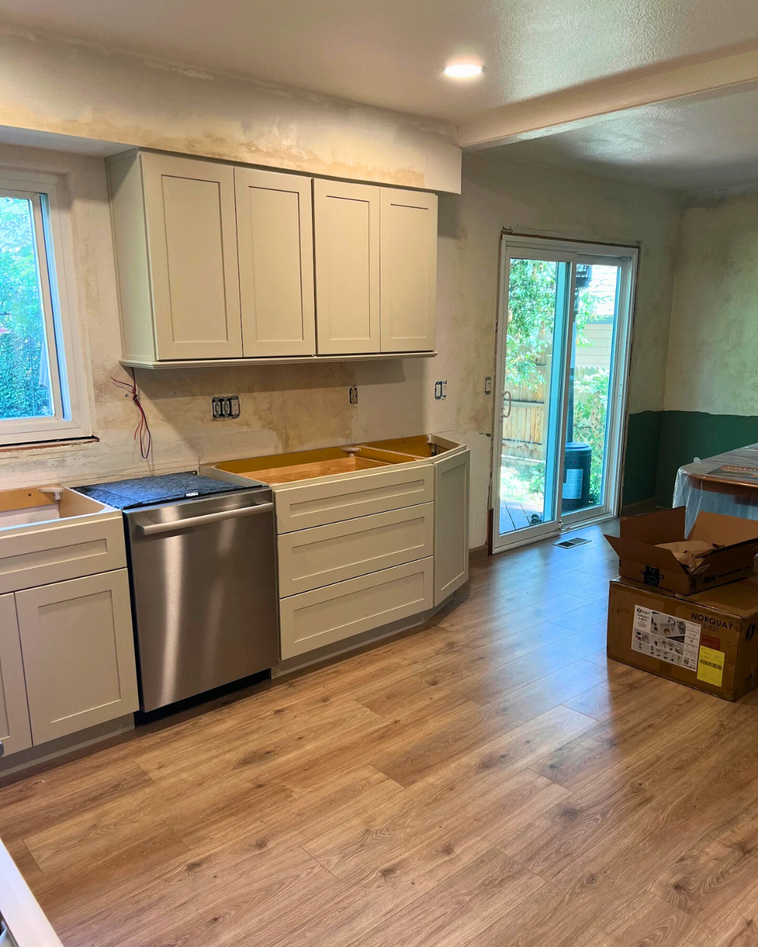 Off White Kitchen Remodel by Partners Remodeling project photo